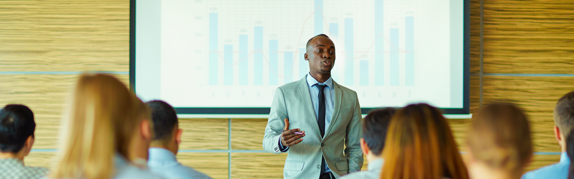 Speaker in front of a crowd