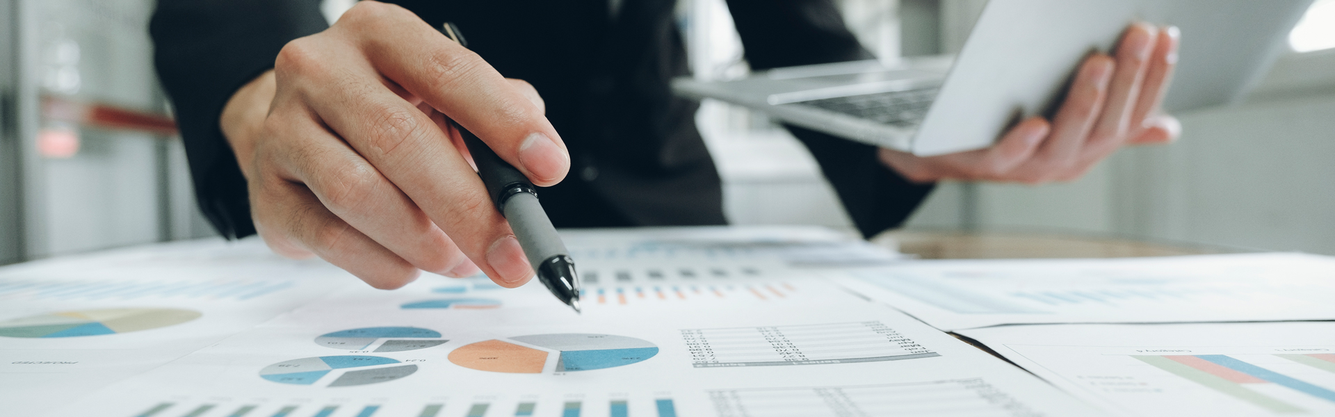 Accountant working on charts