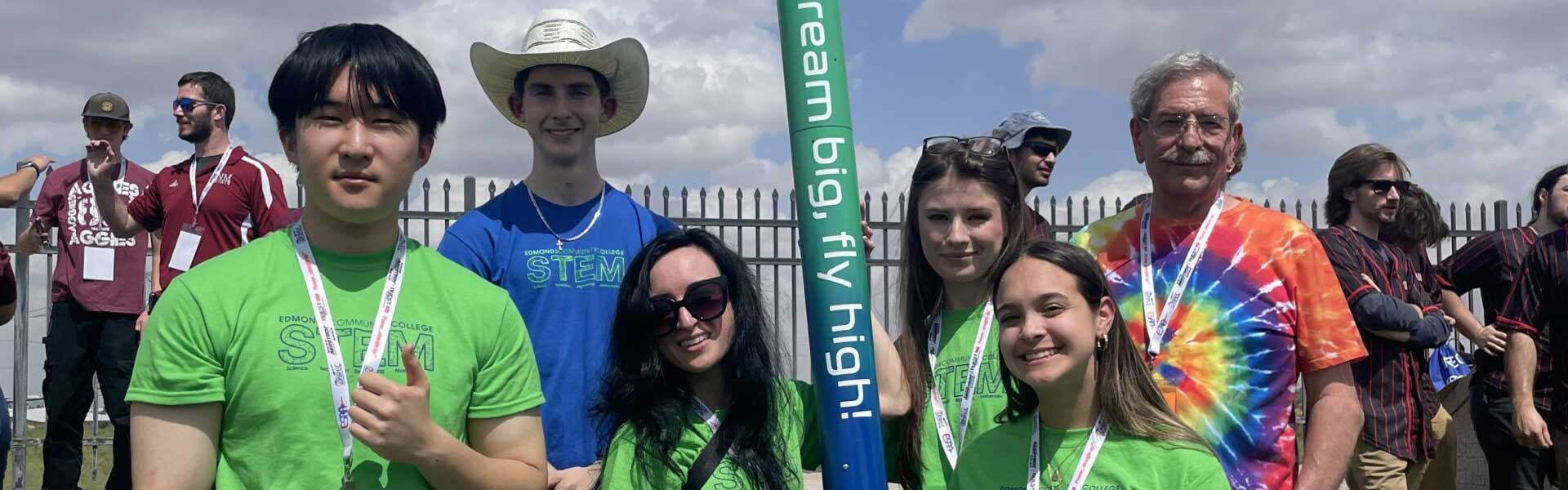 Students setting up a rocket