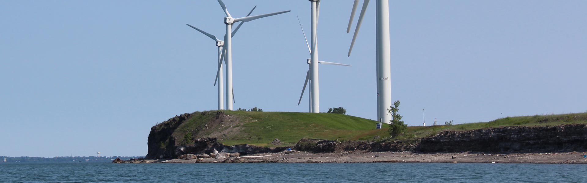 Wind turbines by the water