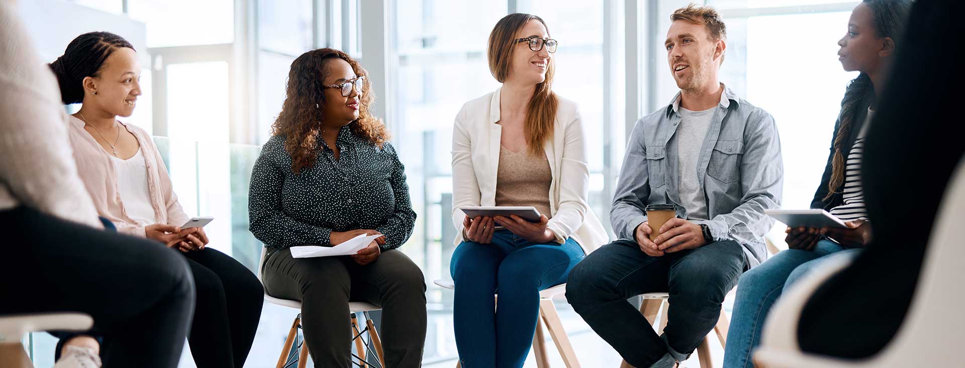 Counselor talking with patients