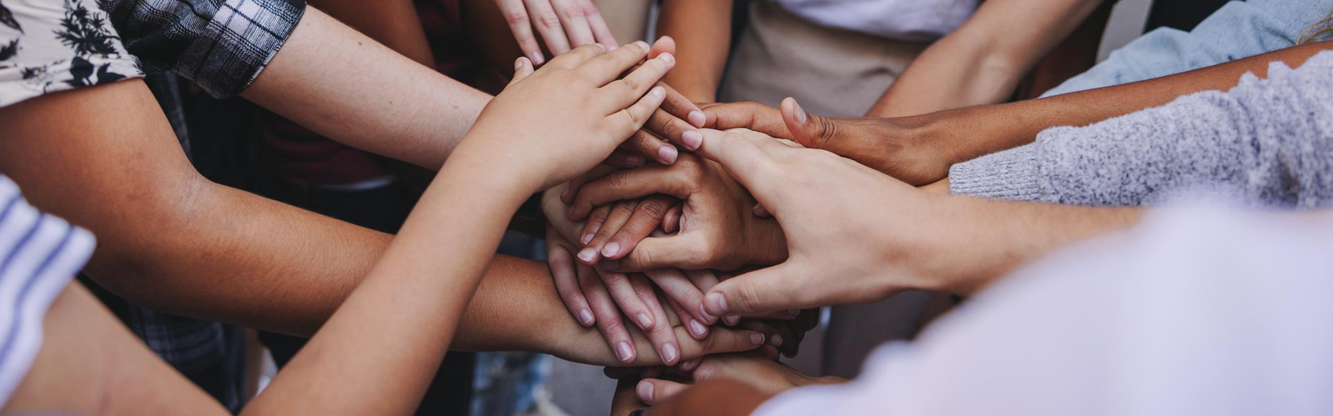 People putting hands together