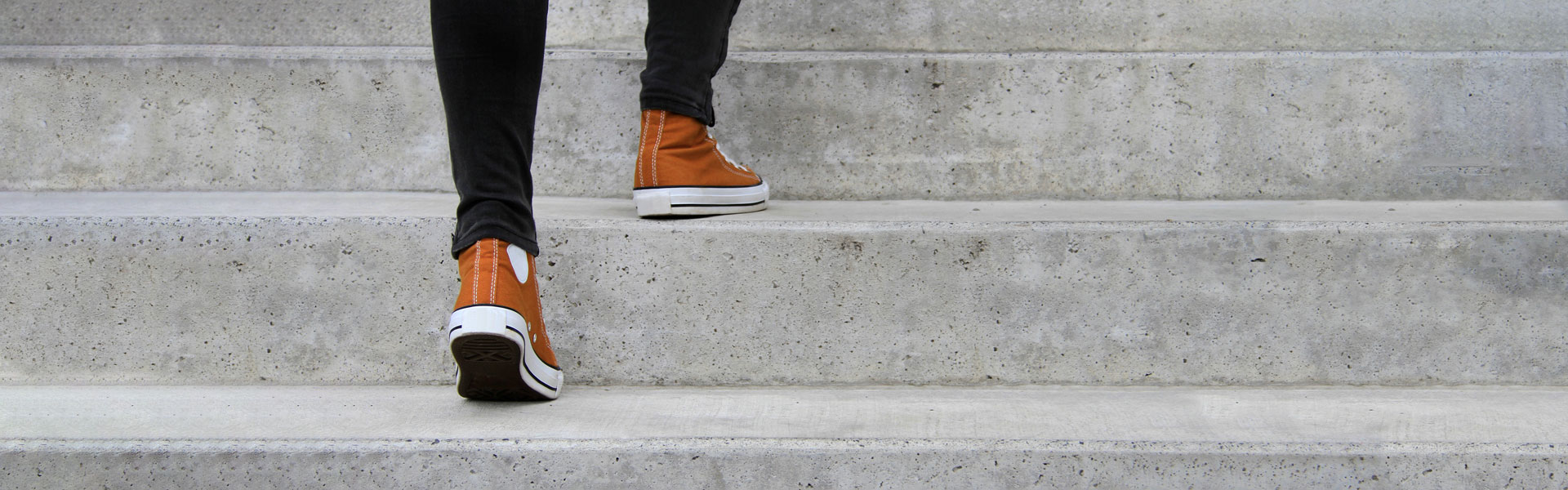 Person walking up stairs